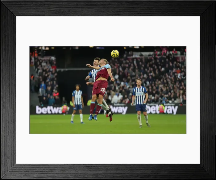 Framed Print : February Face-Off: West Ham United vs. Brighton and Hove Albion in Premier League Action