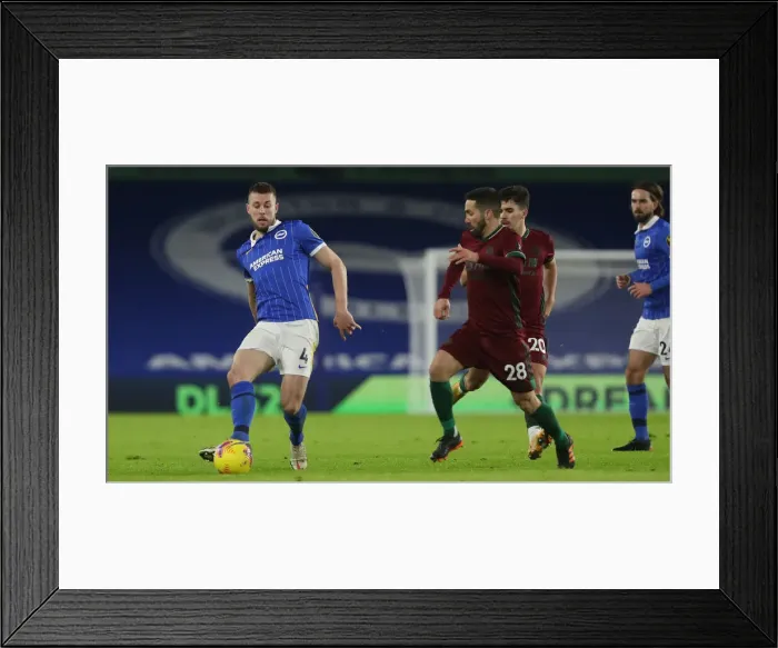 Framed Print : Brighton and Hove Albion vs. Wolverhampton Wanderers: A Premier League Clash at American Express Community Stadium (02JAN21)
