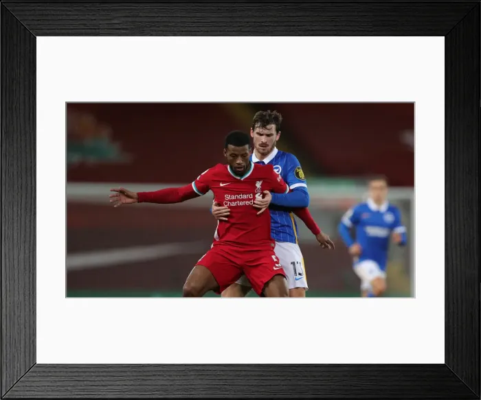 Framed Print : Premier League 03-02-2021: Liverpool vs. Brighton and Hove Albion - Intense Clash at Anfield Framed Print : Premier League 03-02-2021: Liverpool vs. Brighton and Hove Albion - Intense Clash at Anfield
