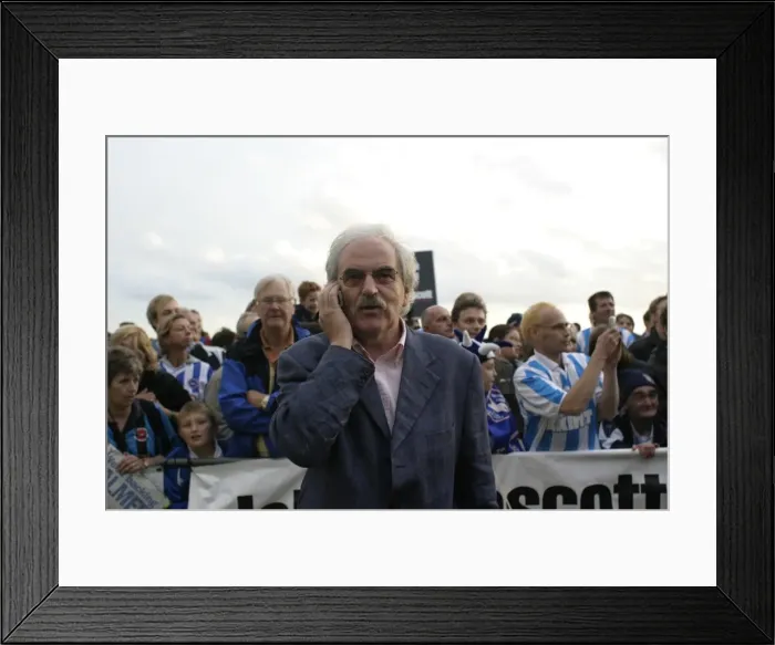 Framed Print : Des Lynam marches for Falmer on the Phone Framed Print : Des Lynam marches for Falmer on the Phone