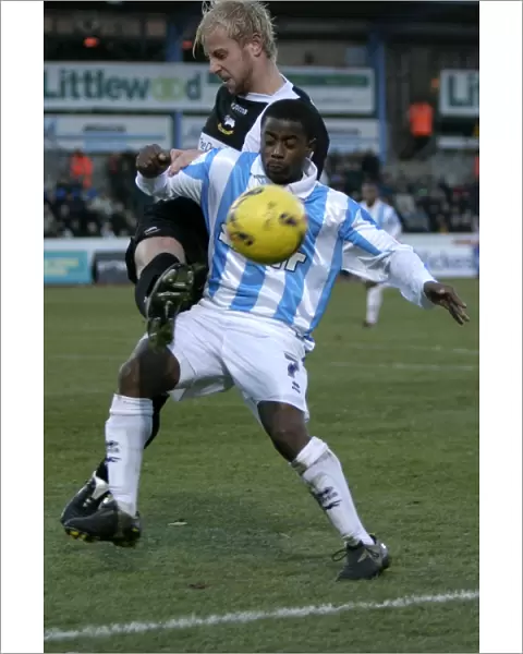 Leon Knight Shields the Ball: A Defensive Moment from Brighton & Hove Albion's 2005 Home Match Against Derby
