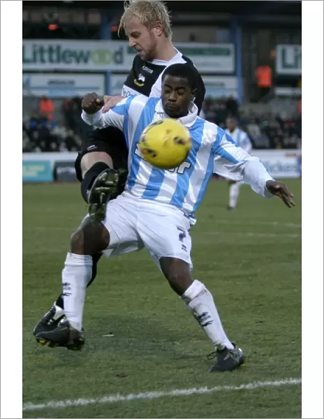 Leon Knight Shields the Ball: A Defensive Moment from Brighton & Hove Albion's 2005 Home Match Against Derby