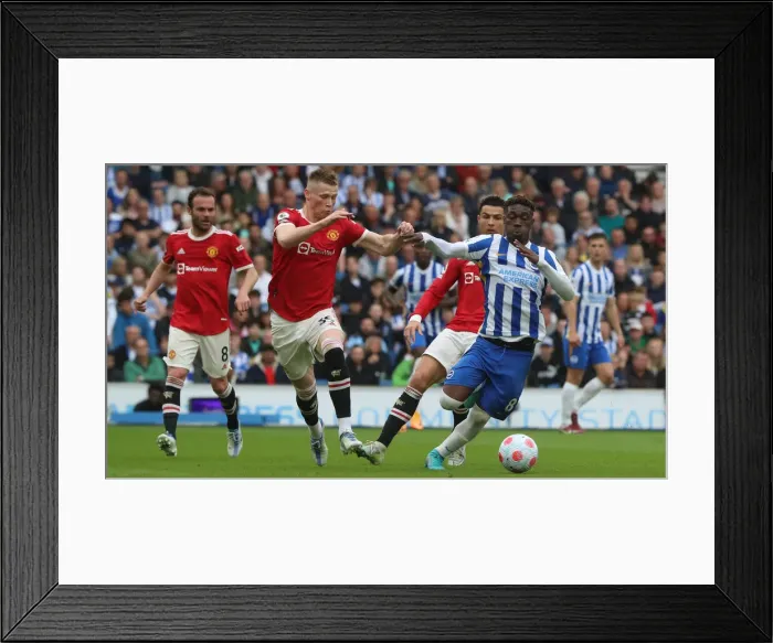 Framed Print : Intense Premier League Showdown: Brighton & Hove Albion vs Manchester United (7th May 2022)