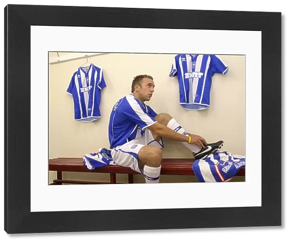 Behind the Scenes: Adam Hinshelwood Gearing Up in Brighton & Hove Albion FC Dressing Room