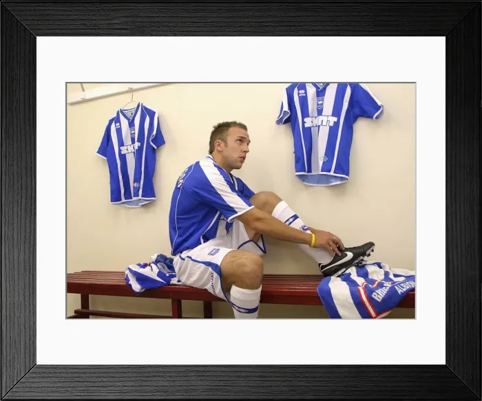 Framed Print : Behind the Scenes: Adam Hinshelwood Gearing Up in Brighton & Hove Albion FC Dressing Room Framed Print : Behind the Scenes: Adam Hinshelwood Gearing Up in Brighton & Hove Albion FC Dressing Room