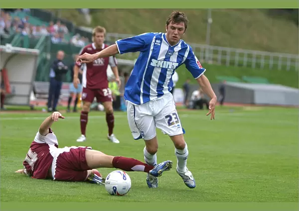 Brighton & Hove Albion's Doug Loft in Action: A Moment of Determination Against Chesterfield