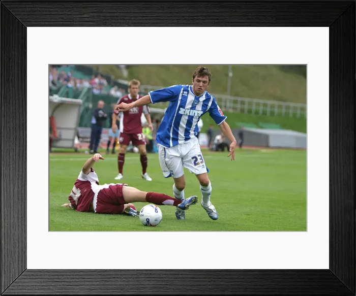 Framed Print : Brighton & Hove Albion's Doug Loft in Action: A Moment of Determination Against Chesterfield Framed Print : Brighton & Hove Albion's Doug Loft in Action: A Moment of Determination Against Chesterfield