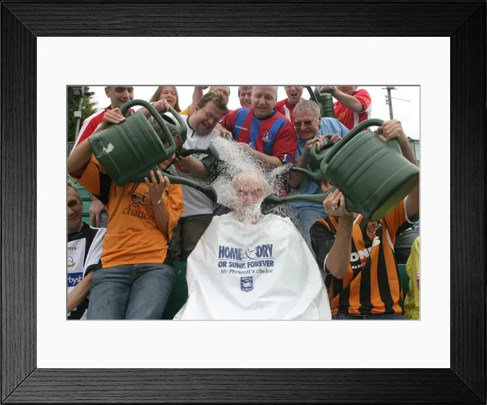 Framed Print : Des Lynam's Muddy Welcome: The Unforgettable Withdean Stadium Experience