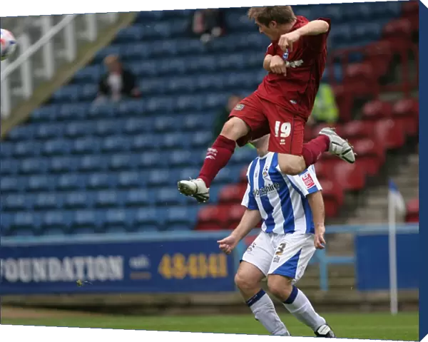 Jake Robinson scores the first of his debut hatrick at Huddersfield