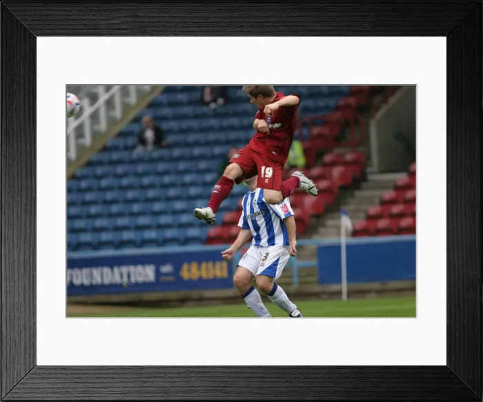Framed Print : Jake Robinson scores the first of his debut hatrick at Huddersfield Framed Print : Jake Robinson scores the first of his debut hatrick at Huddersfield