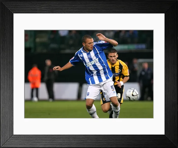 Framed Print : Joel Lynch versus Boston Utd Framed Print : Joel Lynch versus Boston Utd