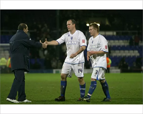 Dean Wilkins congratulates Guy Butters on his performance at the end of the game