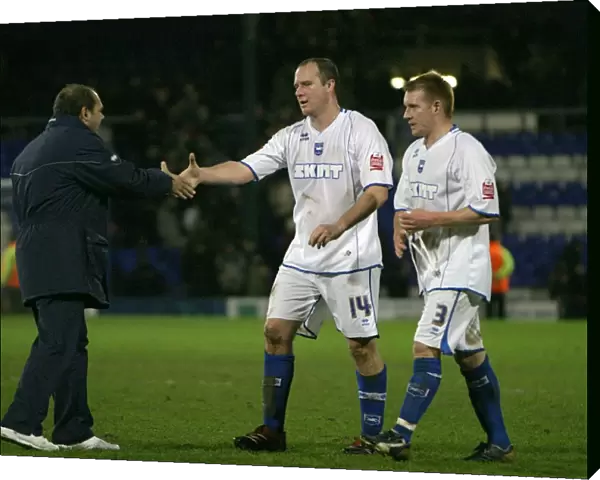 Dean Wilkins congratulates Guy Butters on his performance at the end of the game