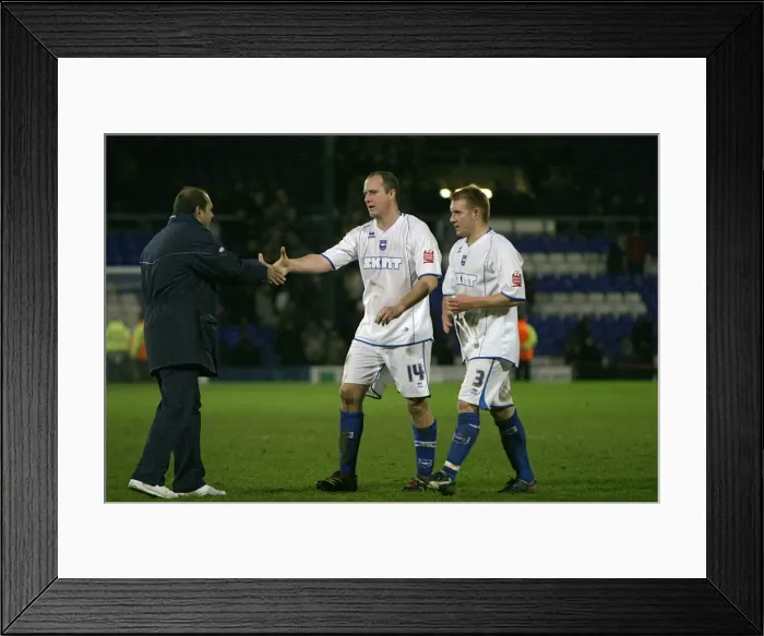 Framed Print : Dean Wilkins congratulates Guy Butters on his performance at the end of the game Framed Print : Dean Wilkins congratulates Guy Butters on his performance at the end of the game