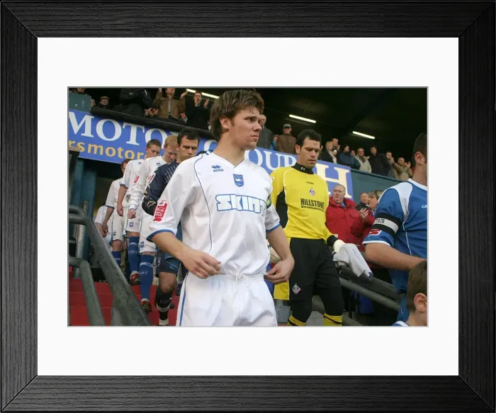 Framed Print : Dean Hammond leads Albion out at Boundary Park Framed Print : Dean Hammond leads Albion out at Boundary Park