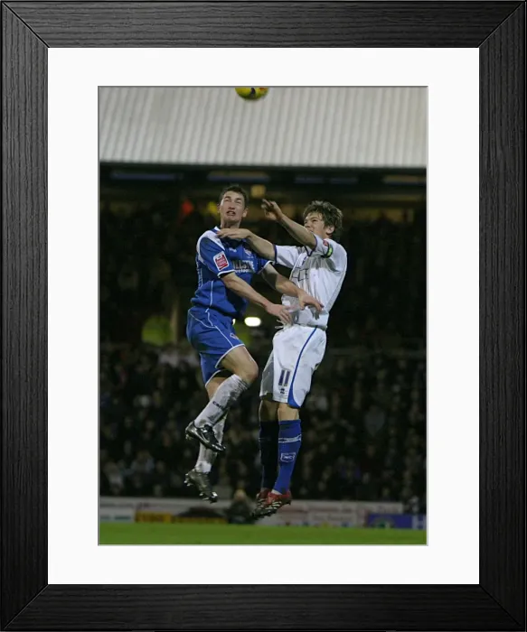Framed Print : Dean Hammond challenges Oldhams Gary MacDonald in the air Framed Print : Dean Hammond challenges Oldhams Gary MacDonald in the air