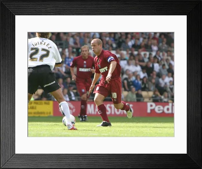 Framed Print : Charlie Oatway in action against Derby County (2005 / 06) Framed Print : Charlie Oatway in action against Derby County (2005 / 06)