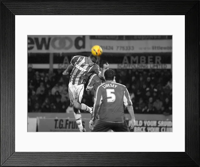 Framed Print : Joel Lynch heads the ball Framed Print : Joel Lynch heads the ball