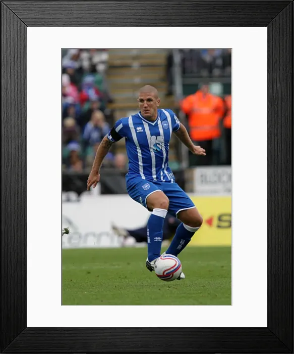 Framed Print : The Focused Defender: An In-Depth Look at Brighton & Hove Albion's Adam El-Abd