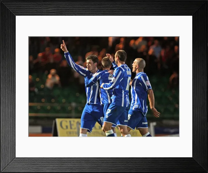 Framed Print : Ashley Barnes celebrates the goal that sealed our promotion to The Championship in 2011 Framed Print : Ashley Barnes celebrates the goal that sealed our promotion to The Championship in 2011