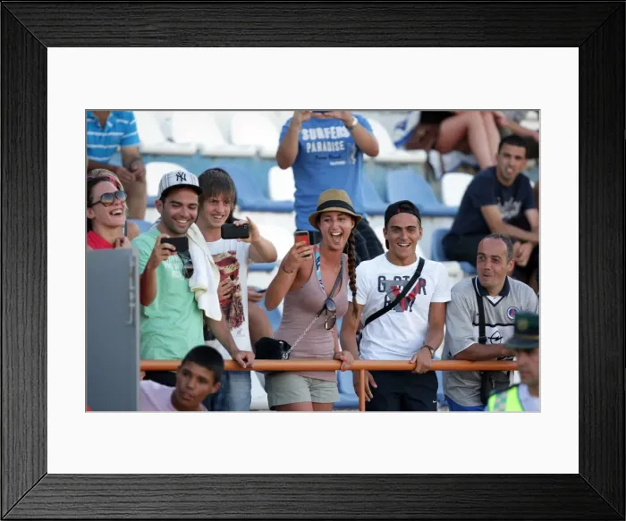 Framed Print : Brighton and Hove Albion FC: Electric Atmosphere in the Stands - Pre-season 2011-12 (Portugal)