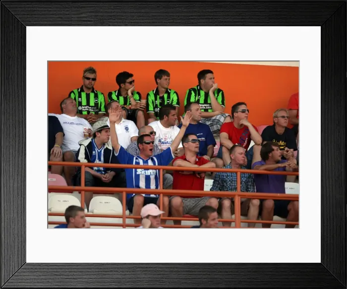 Framed Print : Brighton and Hove Albion FC: Electric Atmosphere of Away Days Crowds - Portugal Pre-season 2011-12