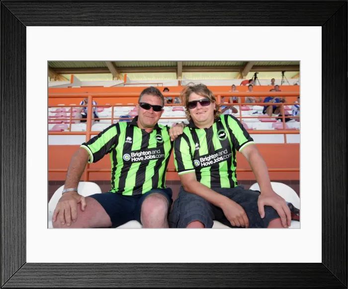 Framed Print : Brighton and Hove Albion FC: Electric Atmosphere in the Stands - Portugal Pre-season 2011-12