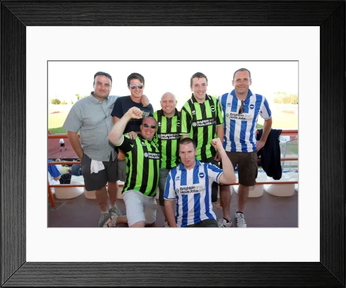 Framed Print : Brighton and Hove Albion FC: Electric Atmosphere of Away Crowds in Portugal Pre-season 2011-12