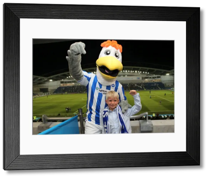 Framed Print : Brighton and Hove Albion's Beloved Mascot, Gully: A Heartwarming Reunion with His Adoring Fans Framed Print : Brighton and Hove Albion's Beloved Mascot, Gully: A Heartwarming Reunion with His Adoring Fans