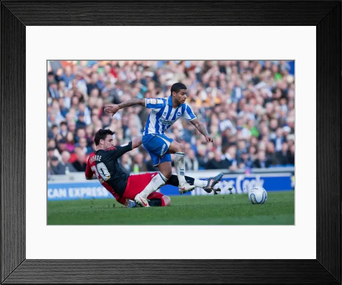 Framed Print : Championship Showdown: Liam Bridcutt's Battle Against Portsmouth at Amex Stadium (March 10, 2012) Framed Print : Championship Showdown: Liam Bridcutt's Battle Against Portsmouth at Amex Stadium (March 10, 2012)