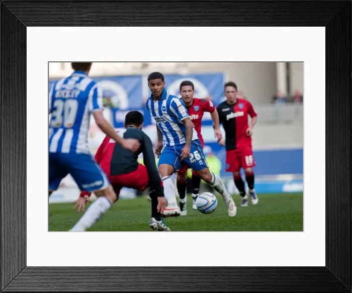 Framed Print : Championship Clash: Liam Bridcutt's Intense Duel Against Portsmouth at Amex Stadium (March 10, 2012) Framed Print : Championship Clash: Liam Bridcutt's Intense Duel Against Portsmouth at Amex Stadium (March 10, 2012)