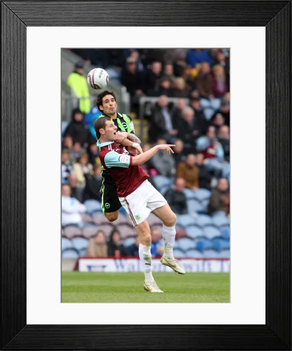 Framed Print : Vicente's Unyielding Spirit: A Defiant Moment for Brighton & Hove Albion at Burnley (April 6, 2012)