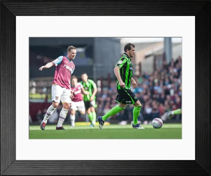 Framed Print : Gordon Greer Faces Off Against West Ham United: Brighton & Hove Albion's Championship Battle at Upton Park (April 14, 2012) Framed Print : Gordon Greer Faces Off Against West Ham United: Brighton & Hove Albion's Championship Battle at Upton Park (April 14, 2012)