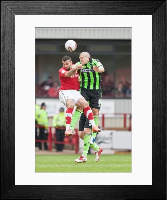 Framed Print : Intense Header Battle: El-Abd vs. Davies, Brighton & Hove Albion vs. Barnsley (April 2012) Framed Print : Intense Header Battle: El-Abd vs. Davies, Brighton & Hove Albion vs. Barnsley (April 2012)