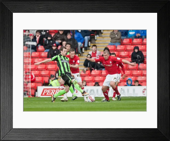 Framed Print : Barnes Battle: Brighton & Hove Albion vs Barnsley, Championship Clash, April 2012 Framed Print : Barnes Battle: Brighton & Hove Albion vs Barnsley, Championship Clash, April 2012