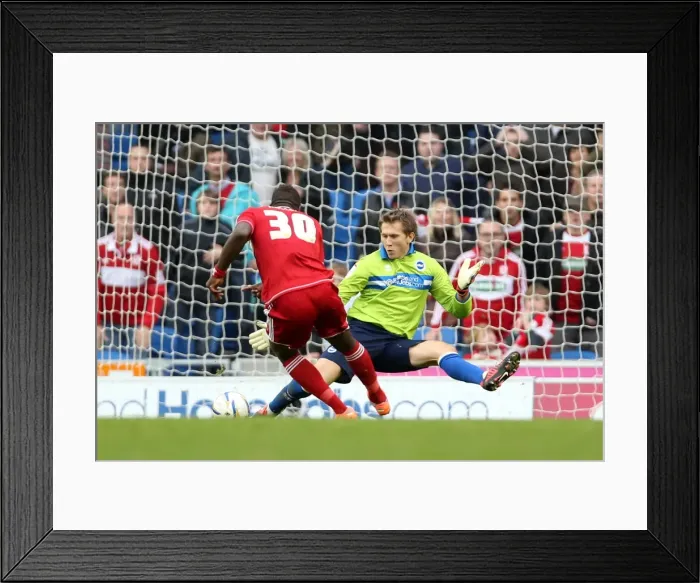 Framed Print : Determined Kuszczak Stands Firm Against Miller: Brighton & Hove Albion vs Middlesbrough (October 2012) Framed Print : Determined Kuszczak Stands Firm Against Miller: Brighton & Hove Albion vs Middlesbrough (October 2012)