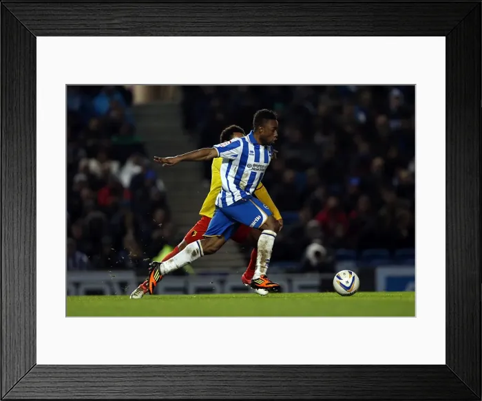 Framed Print : Kazenga LuaLua Sprints Forward in Brighton & Hove Albion vs Watford Championship Clash (December 2012) Framed Print : Kazenga LuaLua Sprints Forward in Brighton & Hove Albion vs Watford Championship Clash (December 2012)