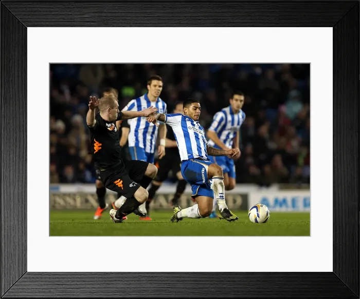 Framed Print : Intense Championship Showdown: Liam Bridcutt's Crunching Tackle Against Derby County (January 12, 2013)