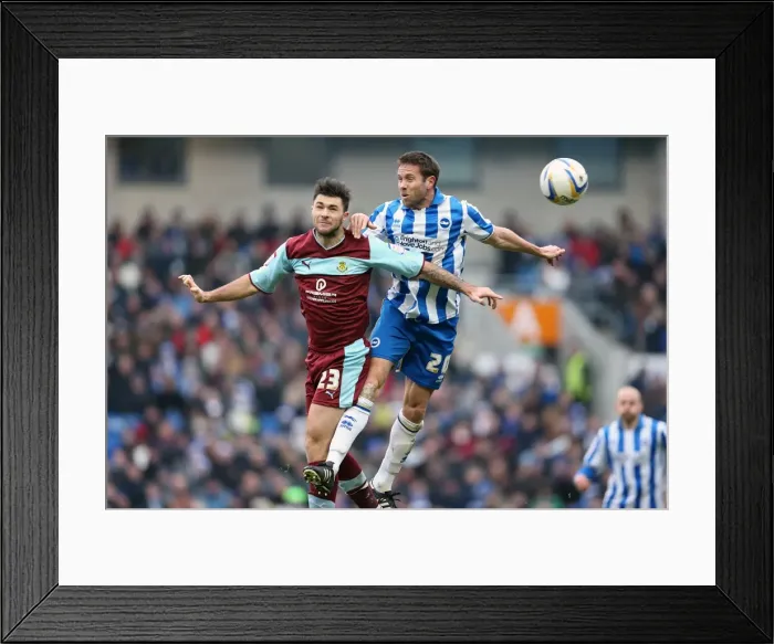 Framed Print : Intense Aerial Clash: Matthew Upson vs. Charlie Austin at Brighton & Hove Albion vs. Burnley (February 23, 2013)