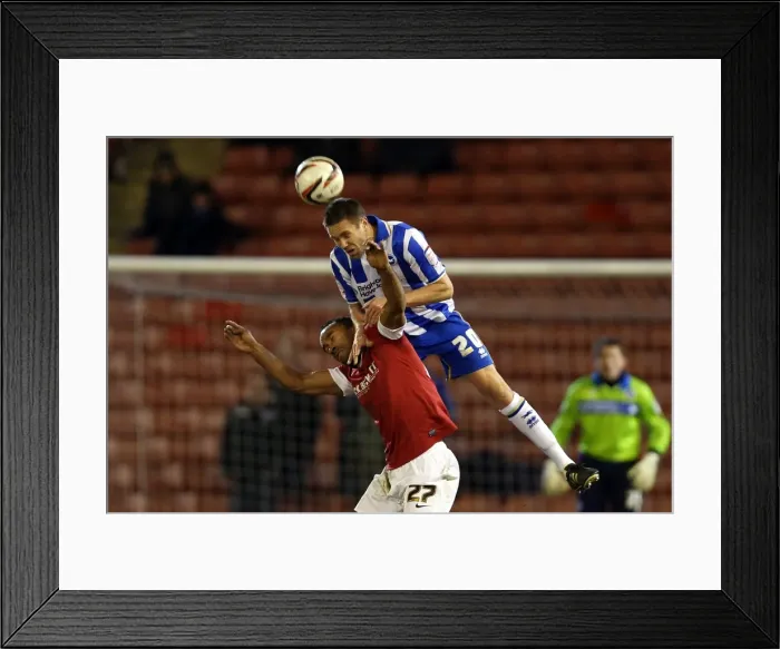 Framed Print : Matthew Upson Wins a Header: Barnsley vs. Brighton & Hove Albion, Championship Clash at Oakwell Stadium (13th March 2013) Framed Print : Matthew Upson Wins a Header: Barnsley vs. Brighton & Hove Albion, Championship Clash at Oakwell Stadium (13th March 2013)