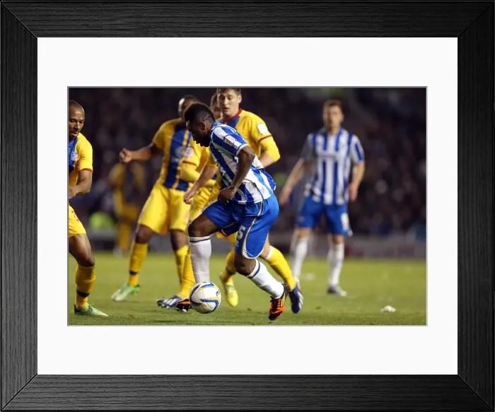 Framed Print : Kazenga LuaLua's Thrilling Aerial Battle: Brighton & Hove Albion vs. Crystal Palace in Championship Play-Off Semi-Final (May 13, 2013)