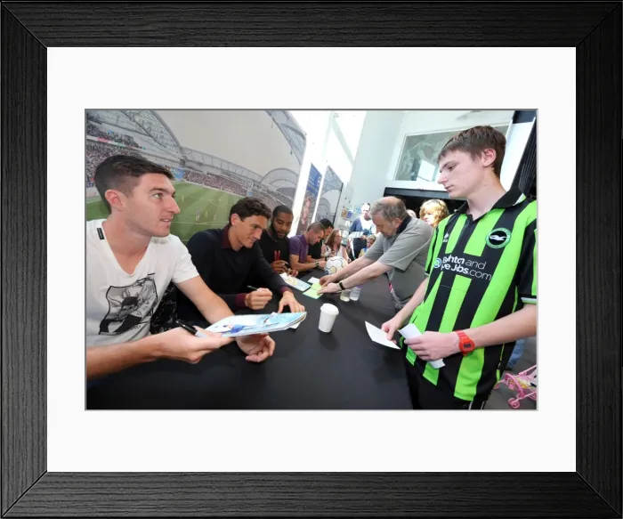 Framed Print : Brighton & Hove Albion FC: 2013 Club Shop Signing Event - Fans Engage with Players Framed Print : Brighton & Hove Albion FC: 2013 Club Shop Signing Event - Fans Engage with Players