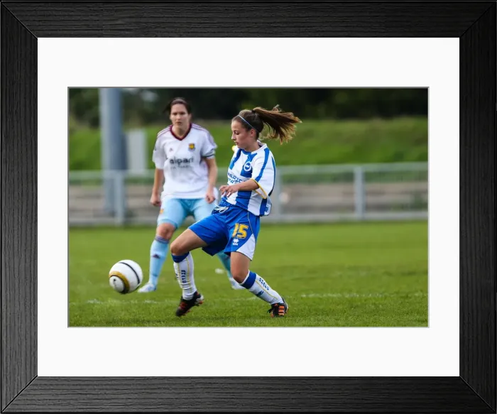 Framed Print : Thrilling Clash: Brighton & Hove Albion vs. West Ham United - Women's Football, 2013-14 Season