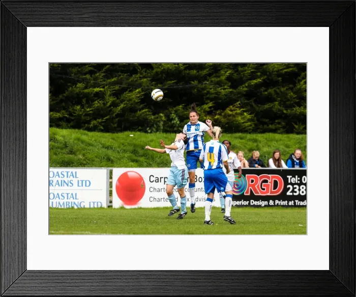 Framed Print : Thrilling Clash: Brighton & Hove Albion vs. West Ham United - Women's Football, 2013-14 Season Framed Print : Thrilling Clash: Brighton & Hove Albion vs. West Ham United - Women's Football, 2013-14 Season