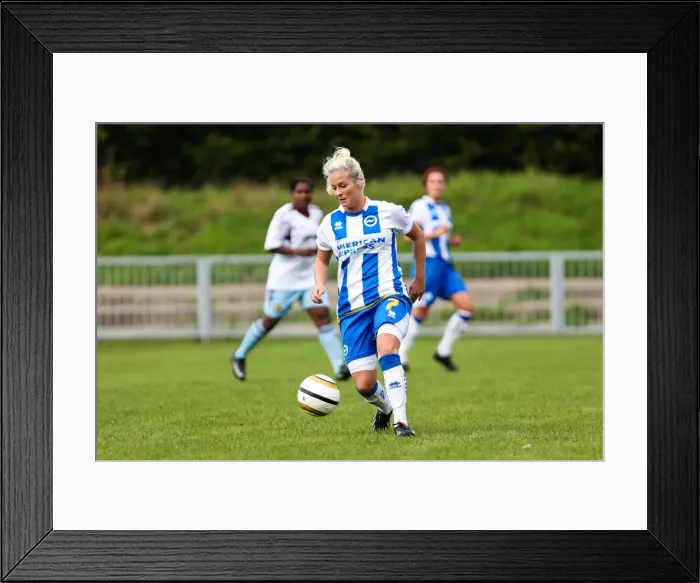 Framed Print : West Ham vs. Brighton & Hove Albion: A Battle in the 2013-14 Women's Football Season