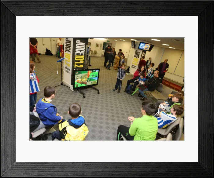Framed Print : Young Seagulls of Brighton & Hove Albion FC Celebrate Christmas 2013 Framed Print : Young Seagulls of Brighton & Hove Albion FC Celebrate Christmas 2013