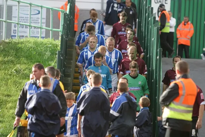 Framed Print : the Albion & Northampton teams leave the Withdean dressing rooms Framed Print : the Albion & Northampton teams leave the Withdean dressing rooms