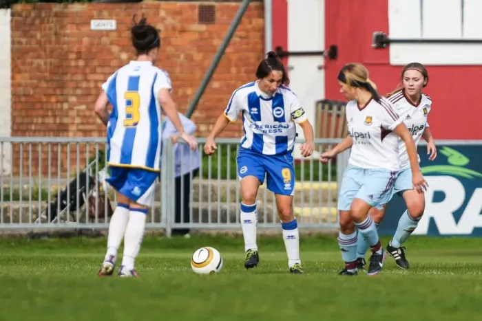 Framed Print : Battle on the Field: Brighton & Hove Albion vs. West Ham United - Women's Football Match, 2013-14 Season Framed Print : Battle on the Field: Brighton & Hove Albion vs. West Ham United - Women's Football Match, 2013-14 Season