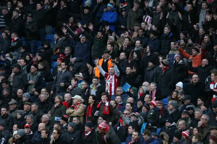 Framed Print : Brentford Fans Amidst the Action: Brighton & Hove Albion vs. Brentford (17Jan15)