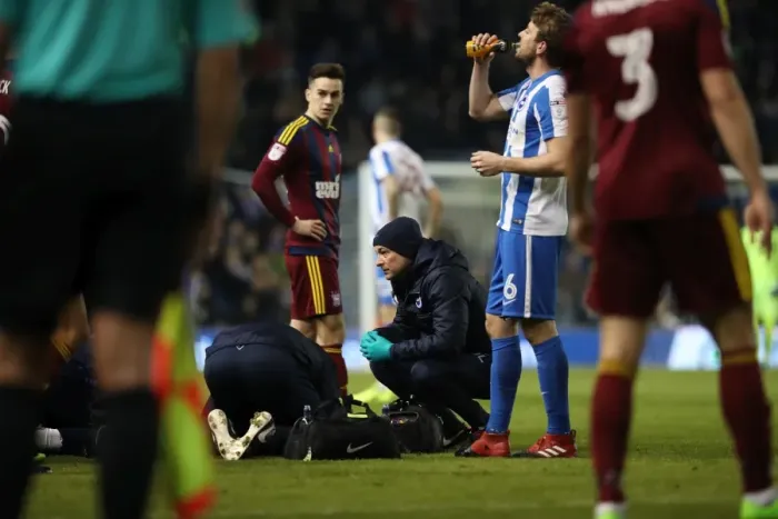 Framed Print : Brighton & Hove Albion: Club Doctor Stephen Lewis Tends to Injured Player during Ipswich Town Match, February 14, 2017